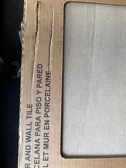 One box of porcelain tiles 12x24 new taupe 17.6sqft