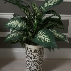 Tall round porcelain pot with silk plants