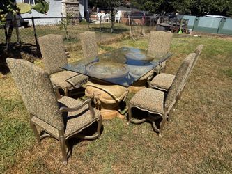 Glass dining table with chairs