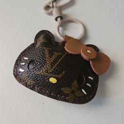 Upcycled with authentic LV material - Hello Kitty 