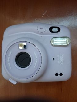 Instax 11 instant camera. Works great.