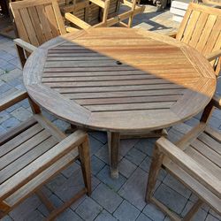 Kingsley-Bate Brand Round Teak Table with Matching Teak Chairs