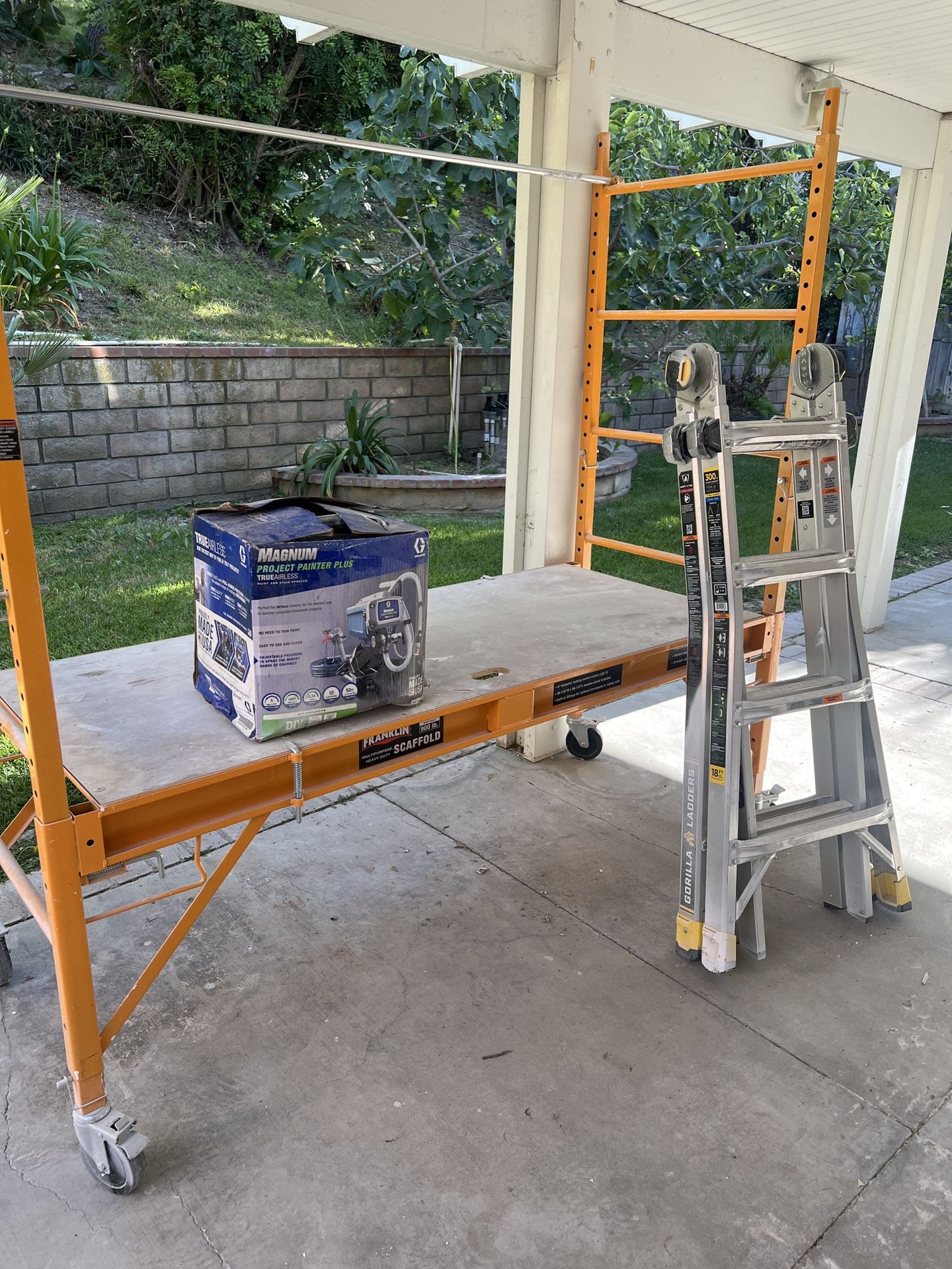 Painting Tools Home Depot Ladder Scaffold Paint Sprayer Tripod Light Pricing for each Scaffold light $45 Orange scaffold $250 Paint Sprayer $300
