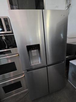 WHIRLPOOL 4 DOOR STAINLESS STEEL REFRIGERATOR