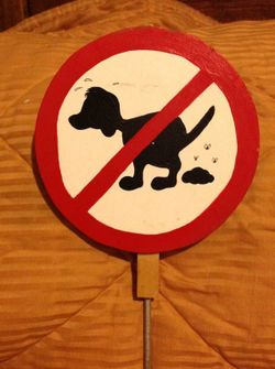 No pooping dog sign