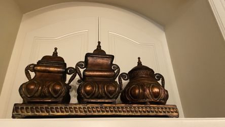 Three Large Canisters On Tray