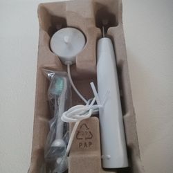 NEW SONICARE ELECTRIC TOOTHBRUSH