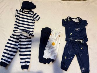 5 baby pjs and 2 extra pj pants size 3-6 months