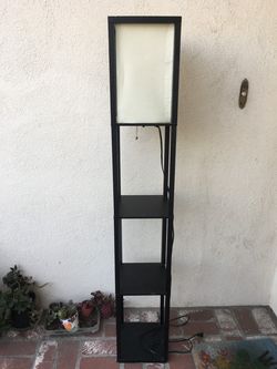 Lamp with storage levels