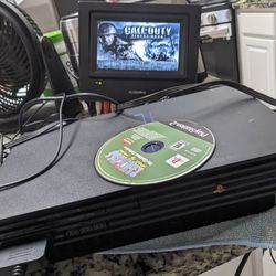 PS2 console 10 games 2 controllers all cords