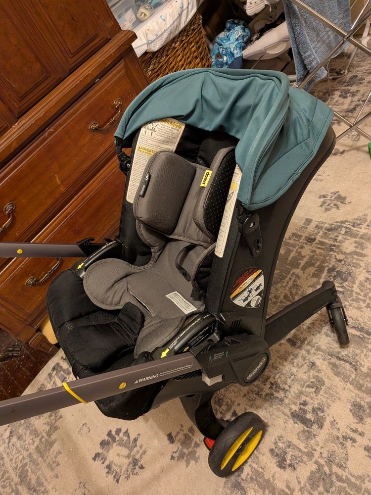 Doona Stroller And Car Seat Base