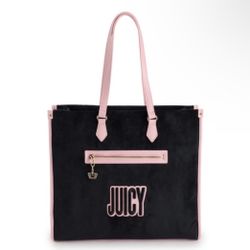 Elegant Juicy Couture tote with a bold black body