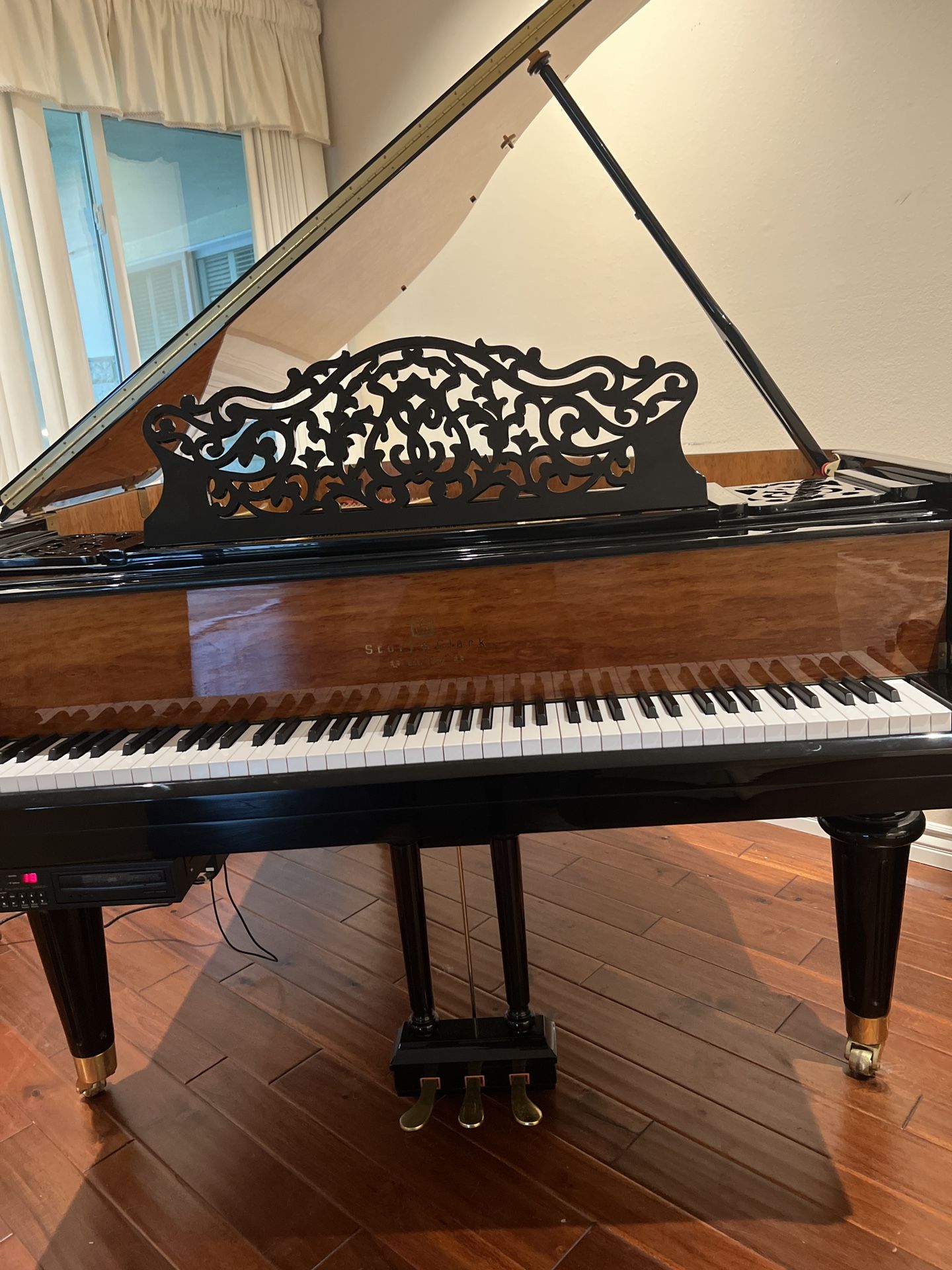 Story and Clark. baby grand player piano