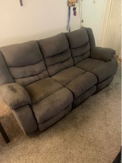 Gray fabric reclining sofa