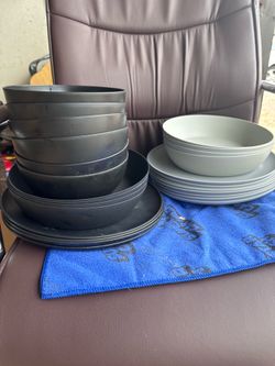 Black and gray plastic dishes