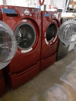 LG front load washer and electric dryer set with pedestal working perfectly with 4 months warranty