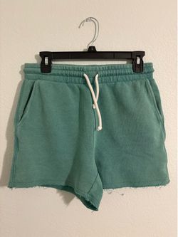 American Eagle terry cloth green women’s soft shorts athletic loungewear trendy elastic waist with drawstring 4 inch inseam ripped hem construction