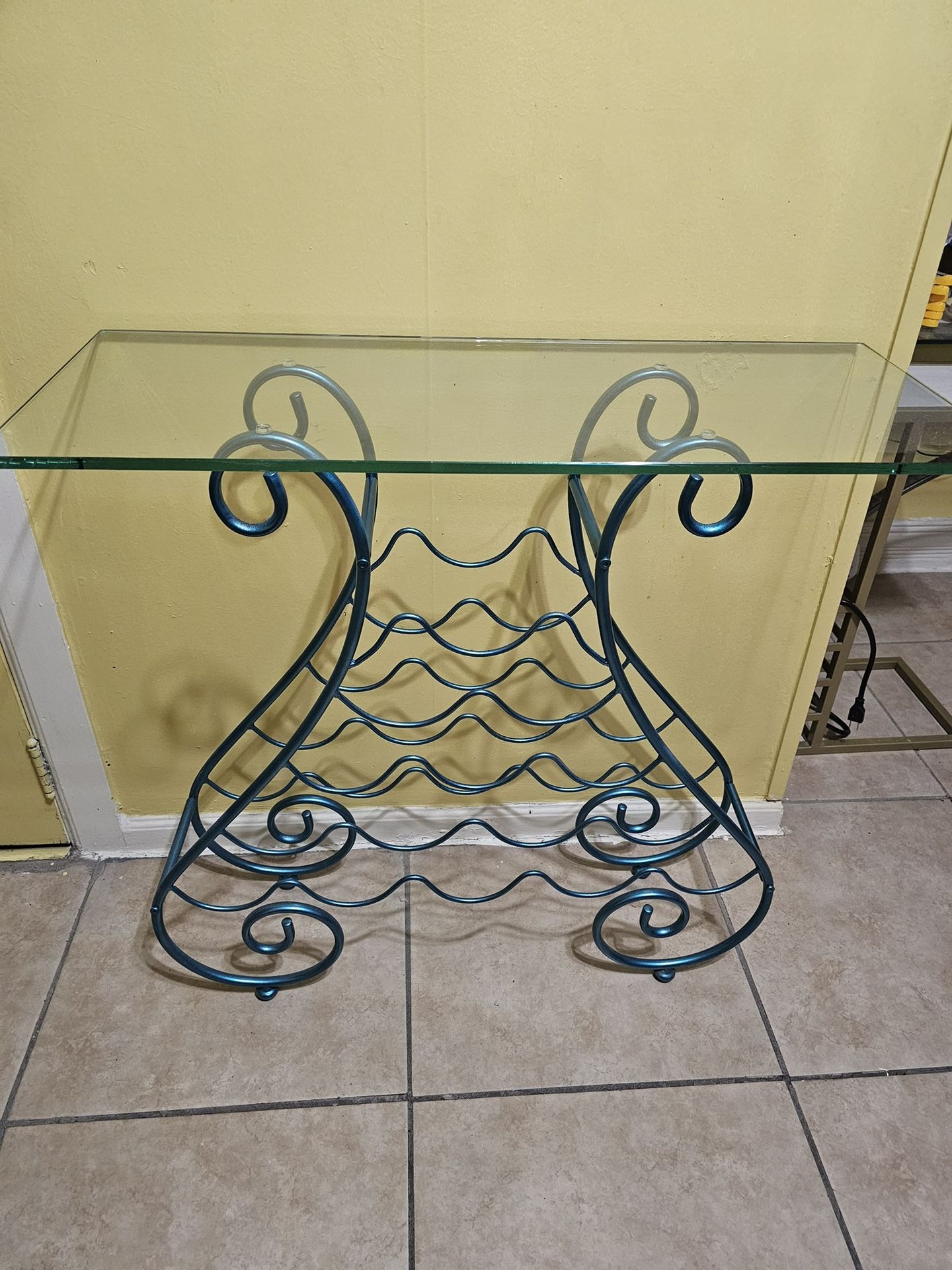 This Beautiful Wine Bottle Table Is In Good Condition