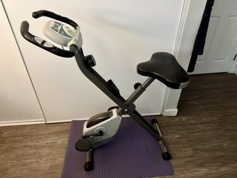 Folding X-Bike – Compact Exercise Bike (Great Condition) Looking to get your cardio in without sacrificing your living space? This Calm fo