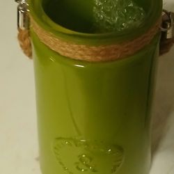 Green glass vase or canister with embossed heart design and rope handle