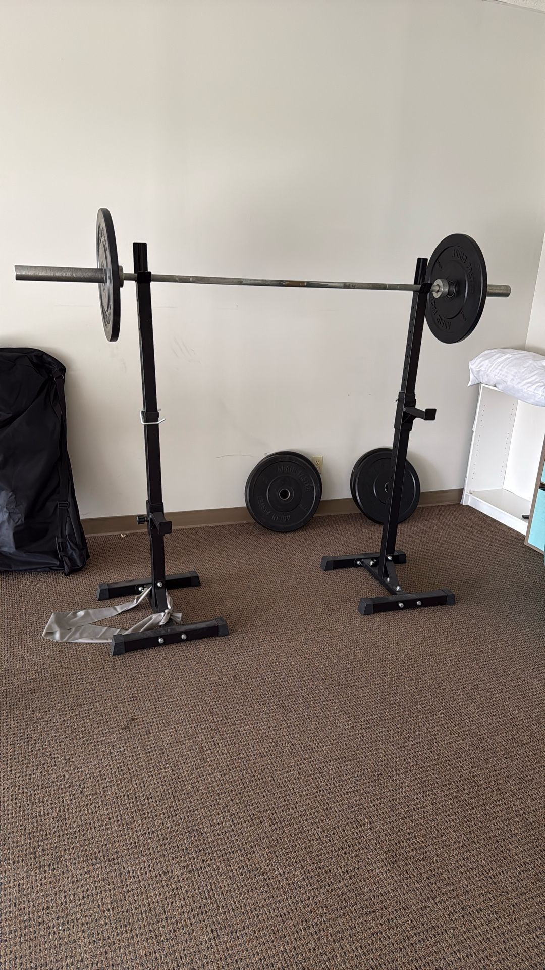 Squat Rack, Barbell, And Weights