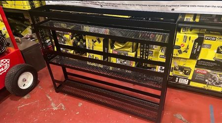 Rack for gallons of chemicals.