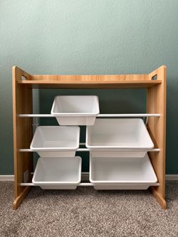 Toy shelf with bins