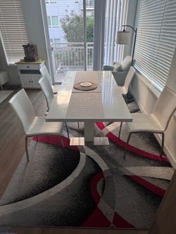 Dining table and 6 chairs & the carpet