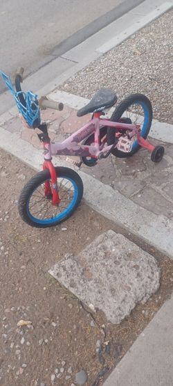 Small bike with small training wheels $25.00