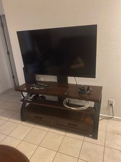 45in TV and Costco TV stand