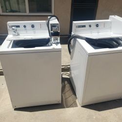 2 Maytag coin operated washing machines