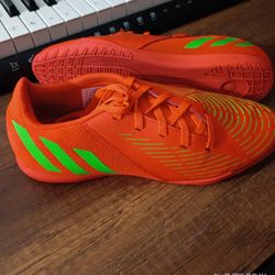 Like New. This is an Adidas Predator Edge.4 in Sala soccer shoe in solar red and solar green.  Us Size 7 