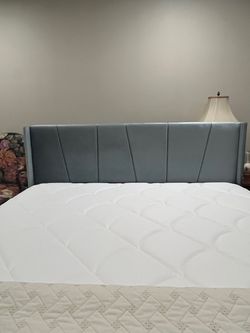 Queen size bed with frame . Queen size mattress that is 12 inches deep