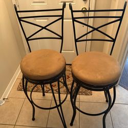 2 Bar Stools, tan/ brown with high back.