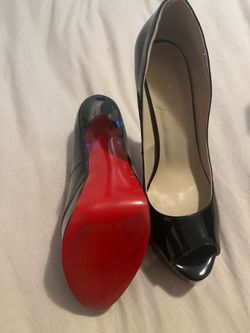 E.K.S Red soles high heels, size 8 and a half,