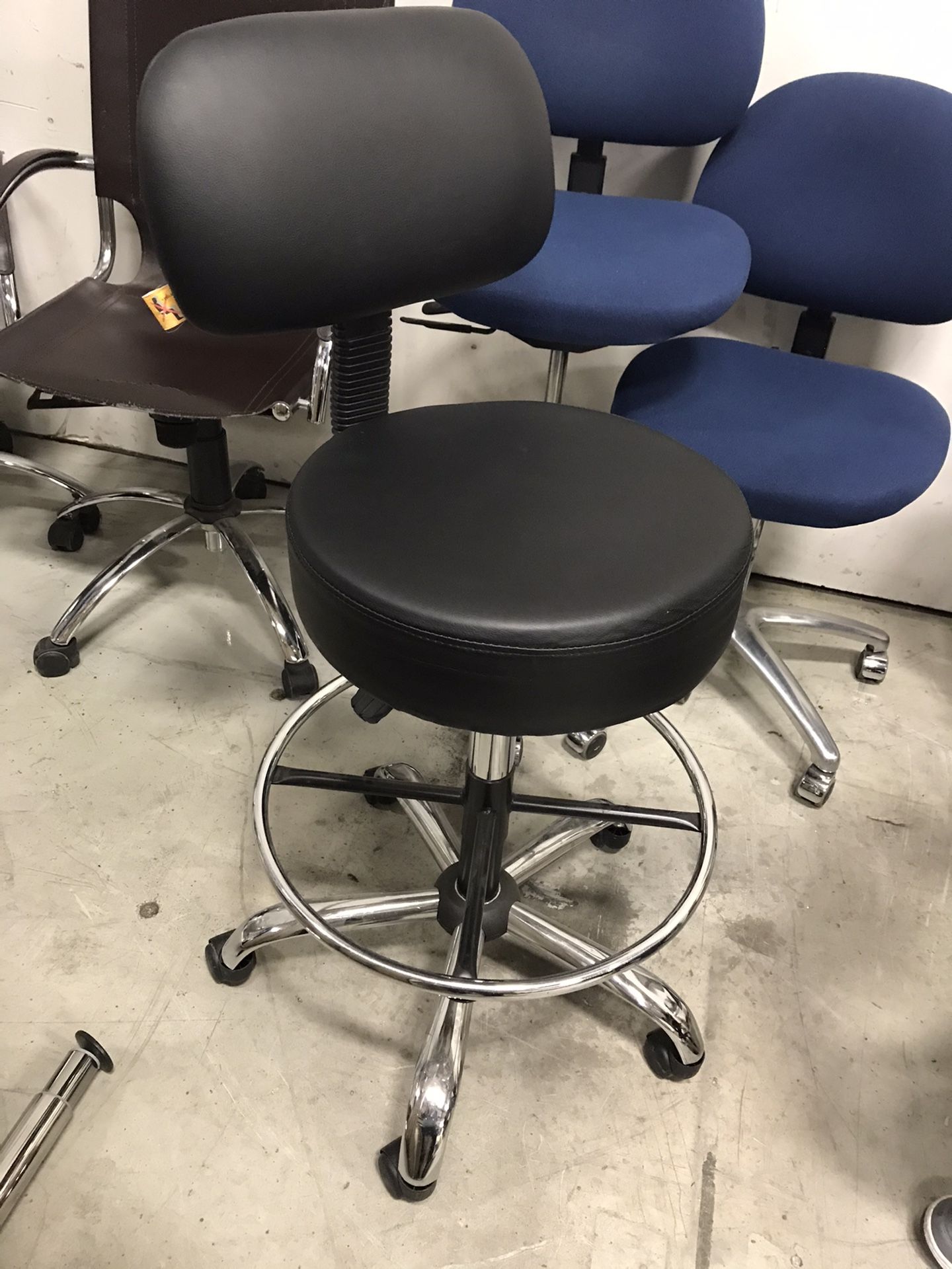 Black office chair with foot rest