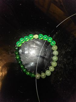 Green Beaded Bracelet with Skull Accent