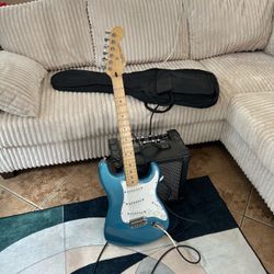 Fender Stratocaster Electric Guitar Metallic Blue, Roland Cube 30X Amp Bundle, and gig bag