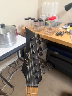 ESP LTD MH-401NT + Agile 7 String + DiMarzios + Metal Zone — $800