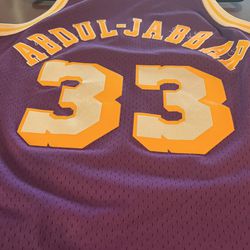 Mitchell & Ness Kareem Abdul-Jabbar Purple Los Angeles Lakers Hardwood Classics Swingman Jersey