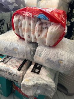 Newborn & size 2 pampers diapers  (with free Dékor diapers pail)