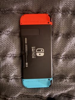 nintendo switch , comes with everything in the picture and micro as card