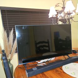 28" LG TV w/ Sound Bar and Subwoofer