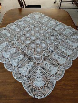 Large centerpiece. Looks crocheted but vinyl