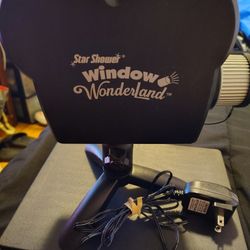 Tested and works. Window Wonderland 12 Christmas & Halloween Movies Window Projector 