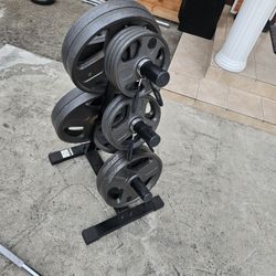 Olympic Weights Set And Barbell + Weight Three 