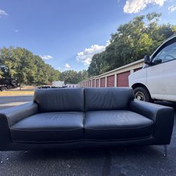 Black Leather Couch ( Delivery Offered ) 