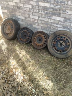 2 tires and 4 wheels for sale. They come off Toyota Corolla. Tire size are P205/55 R16.