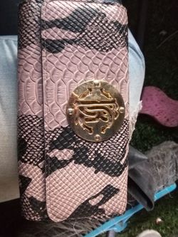 Woman's  Authentic Roberto Cavalli leather tri-fold wallet