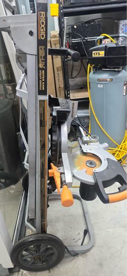 Evolution RAGE sliding saw with RIDGID Universal Miter Saw Stand